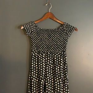 Black and white smocked top romper.